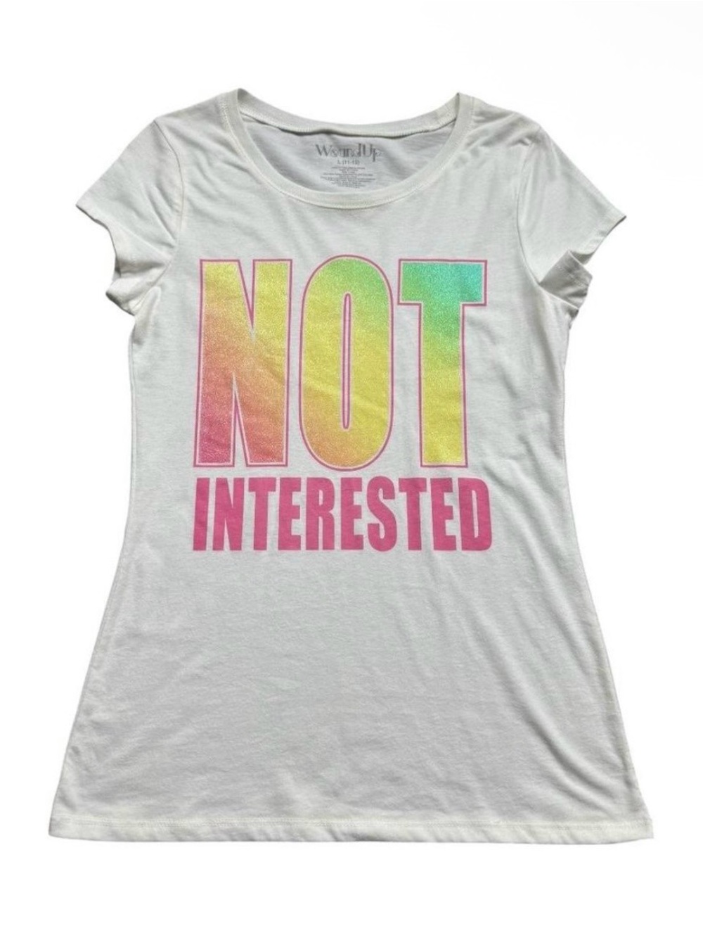 NOT INTERESTED White BabyTee with Rainbow Glittery Font